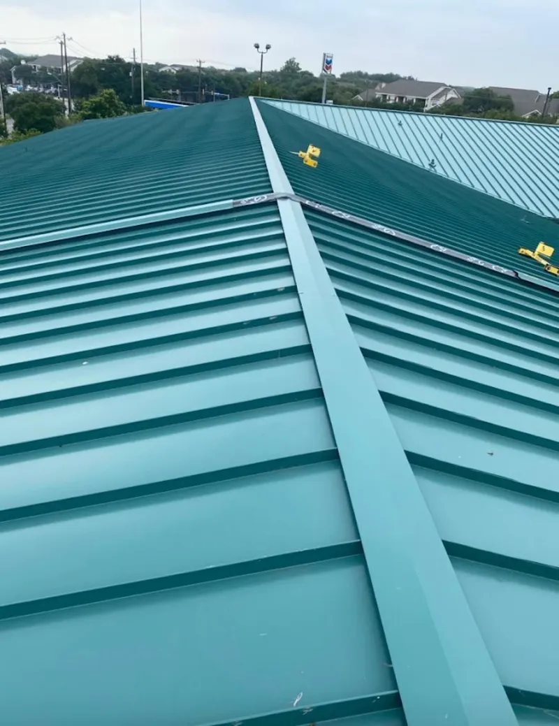 Green commercial metal roof ridge and valley for Metal Roof Repair in Federal Heights