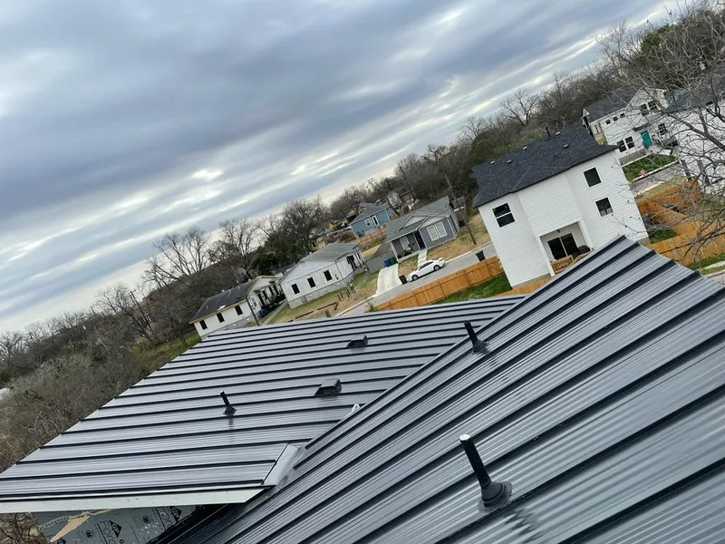 Standing seam metal roof panels with vents for Skylight Repair in Federal Heights